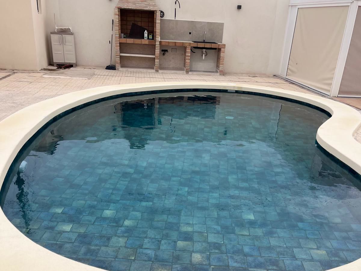 Pool renovated by Piscinas El Pilar in El Chaparral, Torrevieja, with Azul Bali porcelain tiles